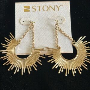 Gold metal earrings for pierced ears.